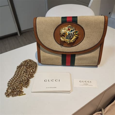 rajah mini bag gucci|Gucci rajah clutch bag.